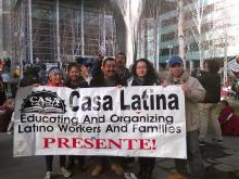 Demonstrators with sign